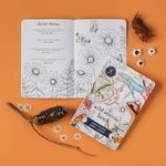 Open activity book with nature-themed illustrations on an orange background